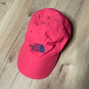 The North Face Pink and Blue Strapback Hat Youth Small. Good‎ used condition.